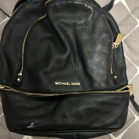 Michael Kors Handbags - Michael Kors Black Leather Backpack with Gold Zippers